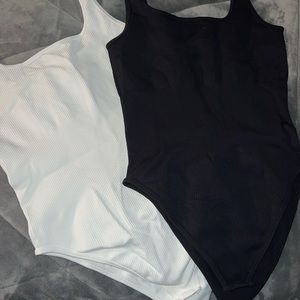 SOLD Black and white bodysuits